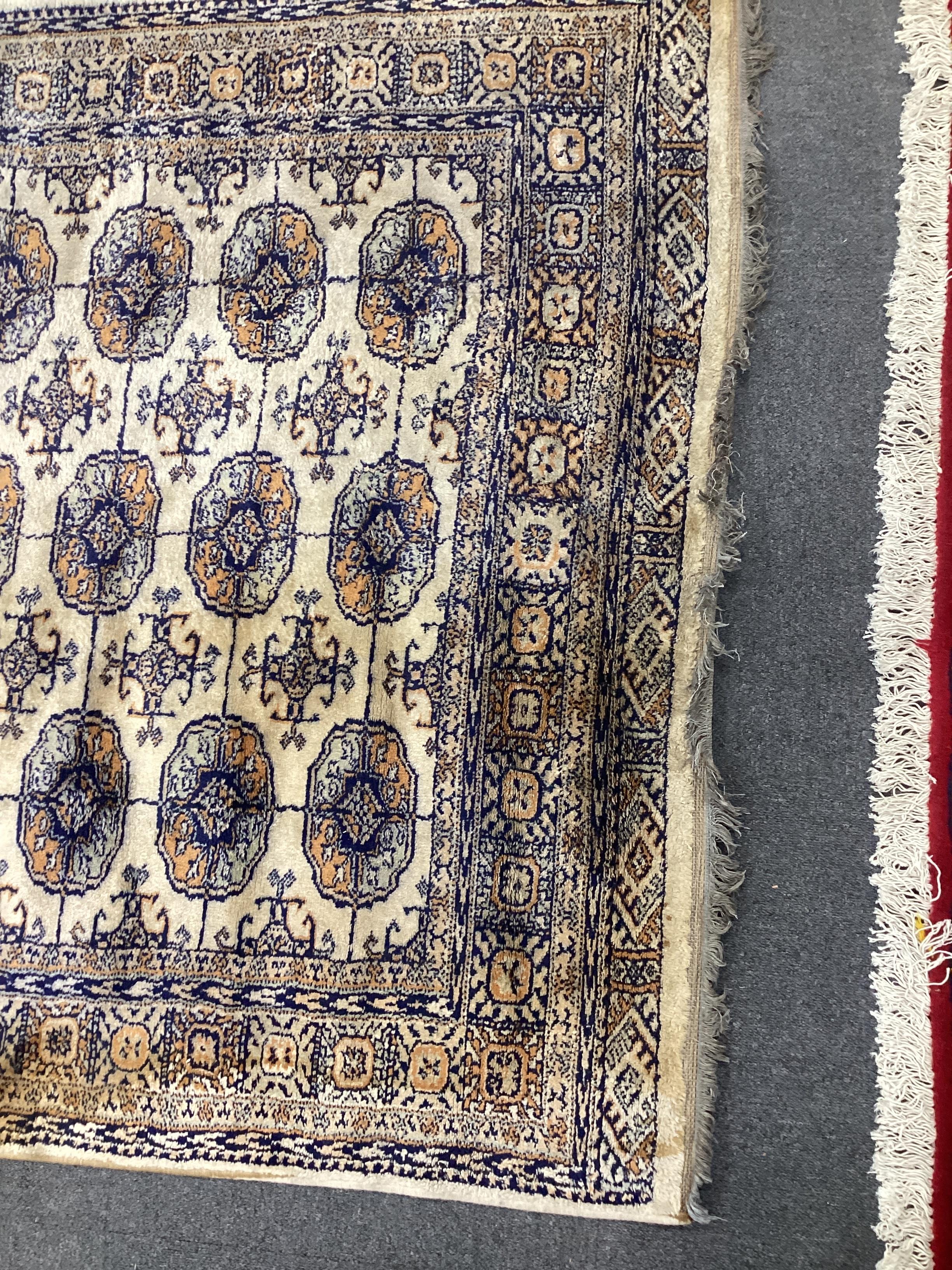 A Bokhara rug and a small Chinese rug, larger 180 x 132cm